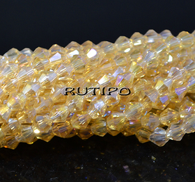 Біконуси Goldenrod AB Plated, 4мм, нитка 35см (бл. 90шт)