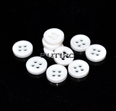White plastic button, 9mm, 1 pc.