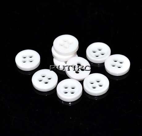 White plastic button, 9mm, 1 pc.